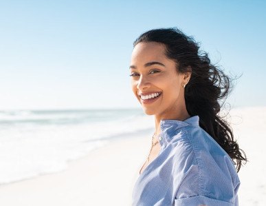 Lady smiles on beach