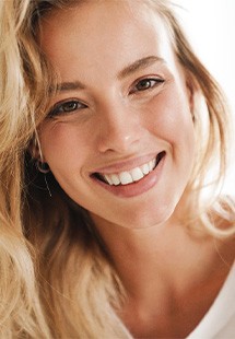 Closeup of woman with blonde hair smiling